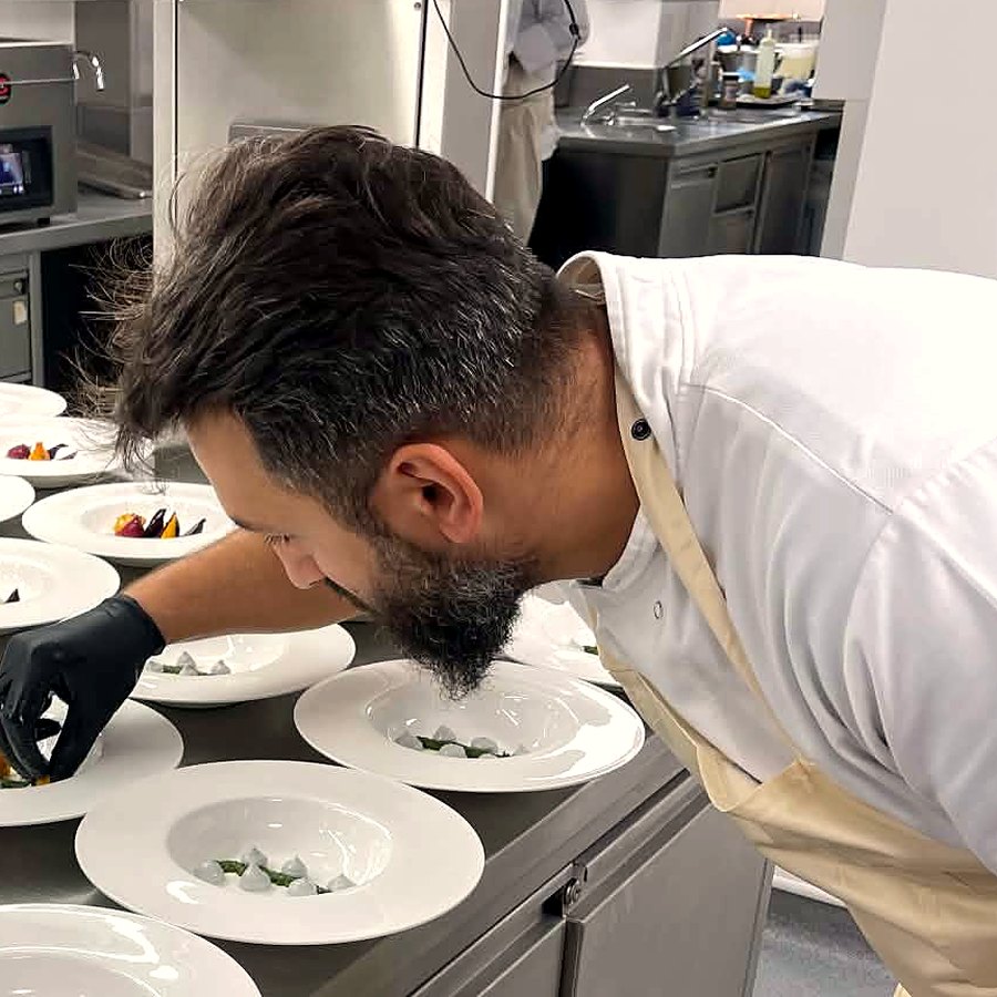 Ionuț Marian Dinu plating a row of starters