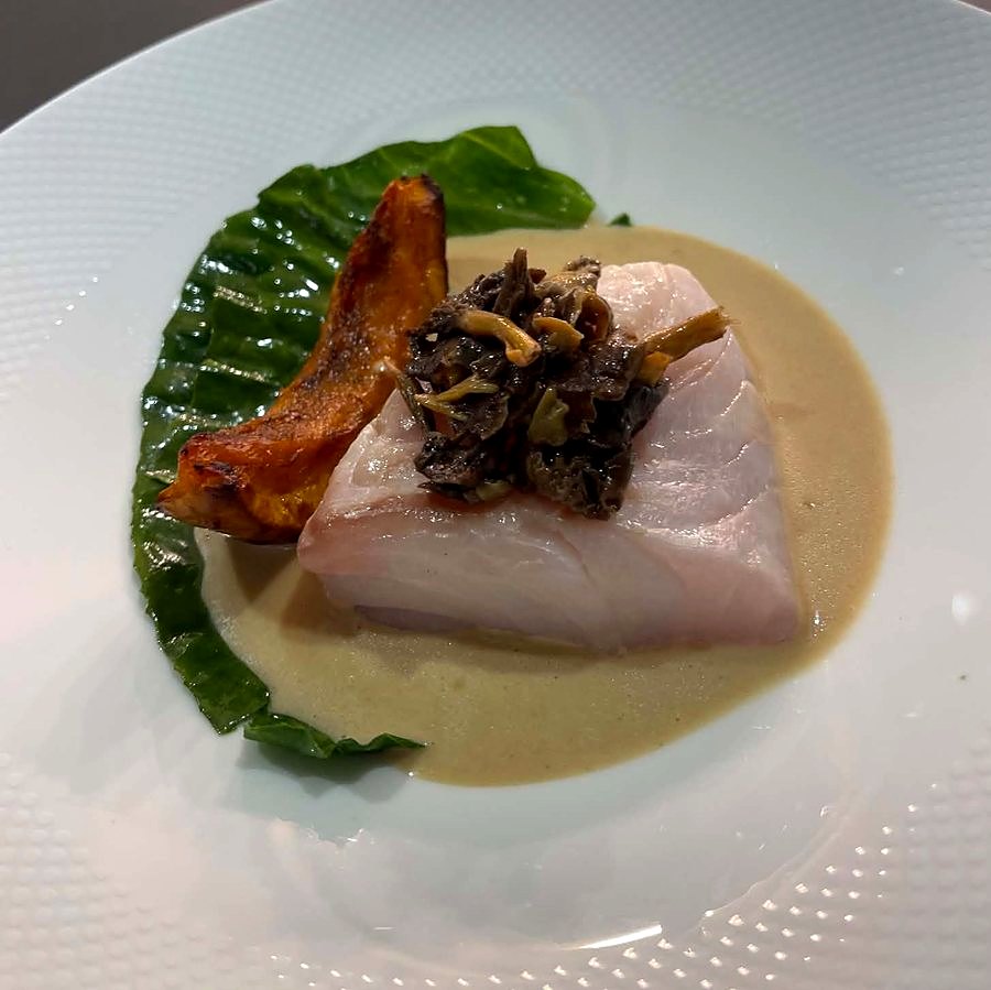 White fish with wild mushrooms, roasted squash, greens and a light sauce